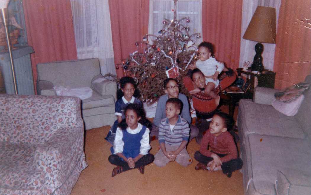 Christmas 1964 with all 7 Miller children in front of a Christmas tree