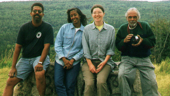 Wayne Miller, Deborah Miller, Tatiana Schlaffer, Leon Smith sitting on a rock